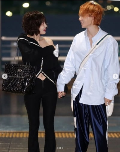 던♥현아, 공항에서도 꿀 떨어지는 눈빛교환...두 손 꼭 잡고[TEN★]