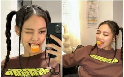 블랙핑크 제니, 힙하게 딴 '양 갈래 머리'…베어 문 귤에 드러난 '상큼美'