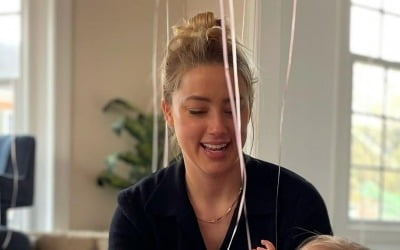 Amber Heard, divorced from Johnny Depp, happy with life in Spain with surrogate daughter