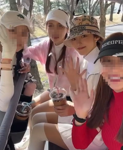 Seo Hayan, wearing a luxury D company hat and playing rounds with friends