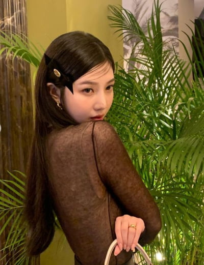 Joy, a delicate girl showing off her microfiber arms