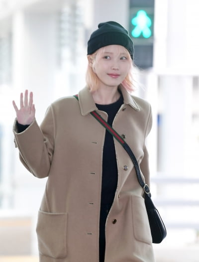 IU, unconventional pictorial on the way out... Smiling Angel