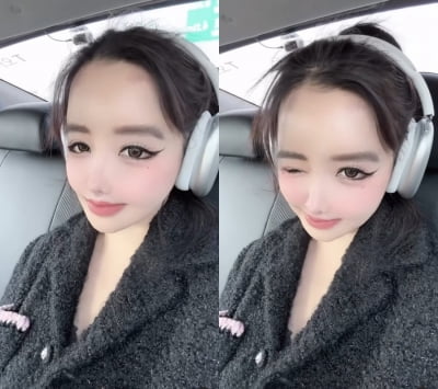아이라인 짙게 뽑은 박봄, 카니발 아닌 '택시' 타고 대낮 귀가