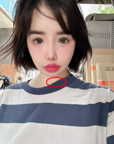 박봄, 필터 안 썼다는데 턱 밀어 넣은 거 들켰네