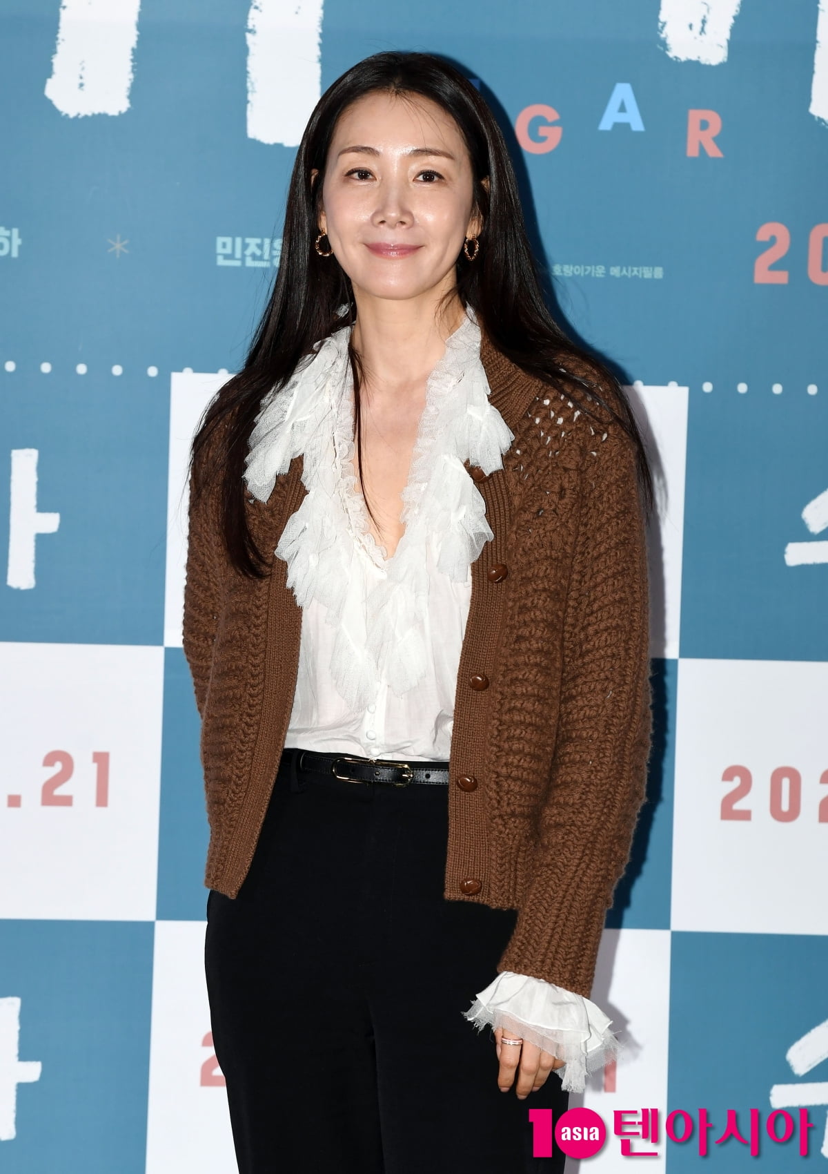 최지우, 가슴이 따뜻한 엄마의 미소[TEN포토]