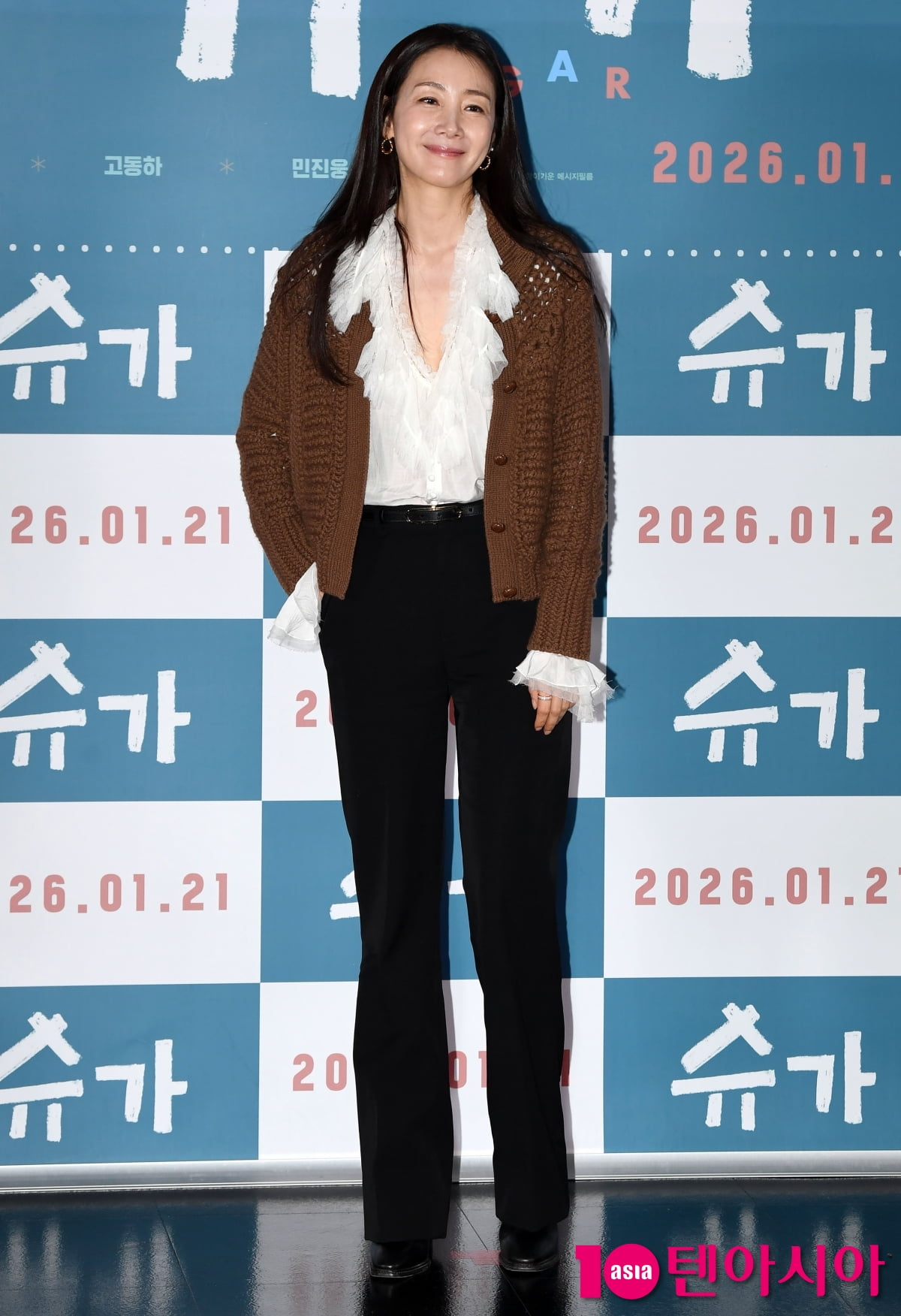 최지우, 가슴이 따뜻한 엄마의 미소[TEN포토]