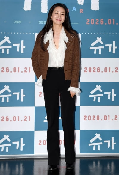 최지우, 가슴이 따뜻한 엄마의 미소[TEN포토]